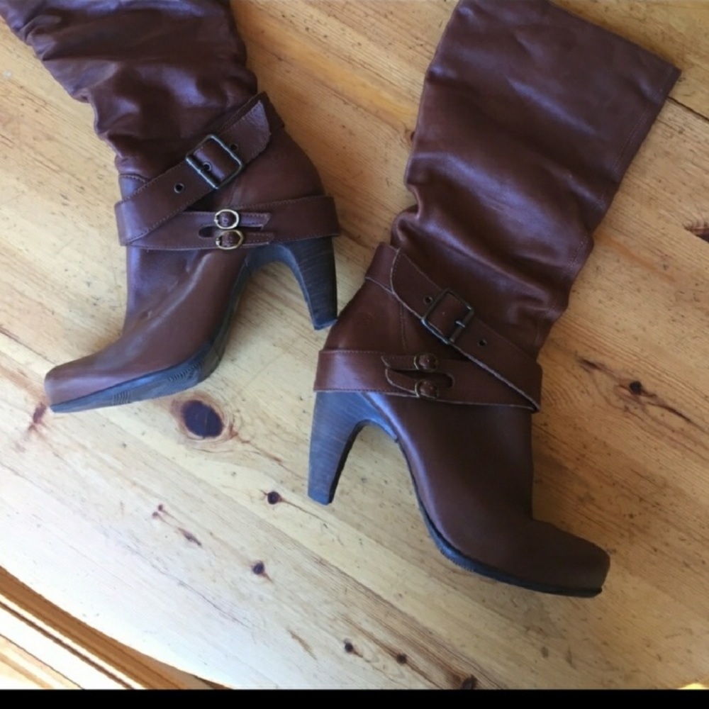 Strapped heeled boots